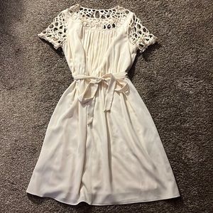 Very cute dress size 10! Light fabric, good quality.